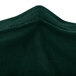 A hunter green Snap Drape spandex table cover.