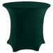 A hunter green Snap Drape spandex table cover on a round table.