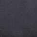 A close-up of a charcoal spandex fabric.