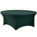 A hunter green Snap Drape spandex table cover on a round table.