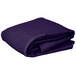 A folded purple rectangular table cover on a white background.