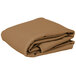 A folded beige rectangular table cover on a white background.