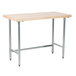 An Advance Tabco wood top work table with a galvanized metal base.