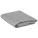 A folded grey table cover on a white background.
