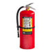 A Badger Advantage fire extinguisher with a black hose and wall bracket.