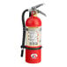 A red Badger Advantage fire extinguisher with a hose and vehicle bracket.