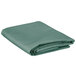 A folded seafoam green rectangular table cover.
