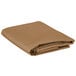 A folded beige rectangular Intedge table cover.