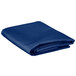 A folded royal blue rectangular table cover.