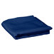 A folded royal blue Intedge table cover.