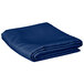 A folded royal blue Intedge rectangular table cover.