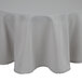 An Intedge gray polyester tablecloth on a round table.