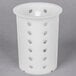 A white plastic Metro flatware cylinder with holes.