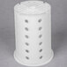 A white polypropylene cylinder with holes.