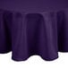 A purple Intedge round tablecloth on a table.