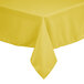 A close-up of a square yellow polyester Intedge tablecloth.