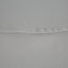 A close up of a gray polyester fabric with a hemmed edge.