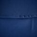 A close up of a royal blue polyester table cover with a hole in it.