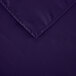 A purple hemmed square table cover by Intedge.
