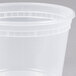 A Pactiv translucent plastic deli container with a lid.