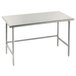 An Advance Tabco stainless steel work table with an open base and metal legs.