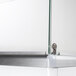 Excellence sneeze guard rails on a glass counter.
