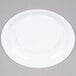 A white Thunder Group Nustone melamine plate with a narrow rim.