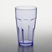 A clear plastic tumbler with a blue rim.