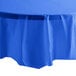 A blue tablecloth on a white table.