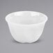A white bowl of GET Diamond White Bouillon on a gray surface.