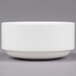 A 10 Strawberry Street white bone china bouillon bowl with a white rim on a gray surface.