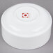A white 10 Strawberry Street bone china bouillon bowl with a red logo.