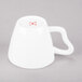 A white porcelain cappuccino cup with a handle.