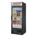 A black True refrigerated glass door merchandiser full of food.