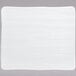 A bright white rectangular wood grain porcelain platter.