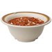 A red GET Diamond Rodeo melamine bowl with soup and onions.