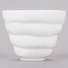 A 10 Strawberry Street bright white porcelain sorbet cup with wavy lines.