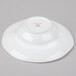 A white porcelain pasta bowl with a textured rim.