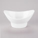 A white bowl with a curved edge.