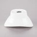 A close-up of a white 10 Strawberry Street Whittier oval bowl with a lid on top.
