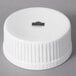 A white round 10 Strawberry Street porcelain ramekin with a logo on it.