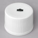 A white cylinder with a logo on it.