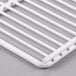 A white coated wire shelf with a metal grid.