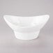 A white 10 Strawberry Street Whittier porcelain oval bowl with a curved edge.