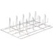 A metal rack with many small spikes.