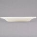 A Tuxton Reno eggshell white china plate on a white background.