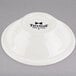A white Tuxton narrow rim china bowl with black text that says "Nevada" on it.
