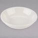 A Tuxton eggshell white china fruit bowl.