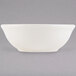 A white Tuxton china nappie bowl.