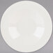 A white Tuxton pasta bowl with a white rim.